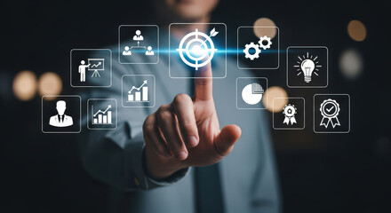 Interactive Business Strategy and Goal Achievement A Person Touching a Digital Interface Displaying Icons Representing Planning Development and Success