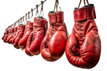 Row of vintage red leather boxing gloves hanging on a line isolated on transparent background, symbolizing the sport of boxing and the spirit of competition