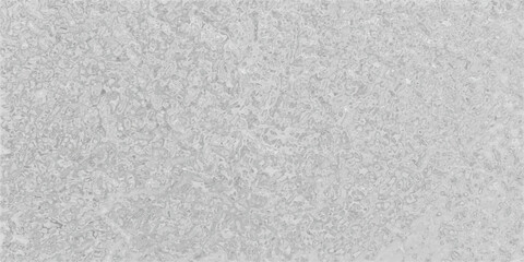 A textured gray surface composed of small organic shapes resembling interlocking forms with a subtle pattern and slight variations in tone across the surface