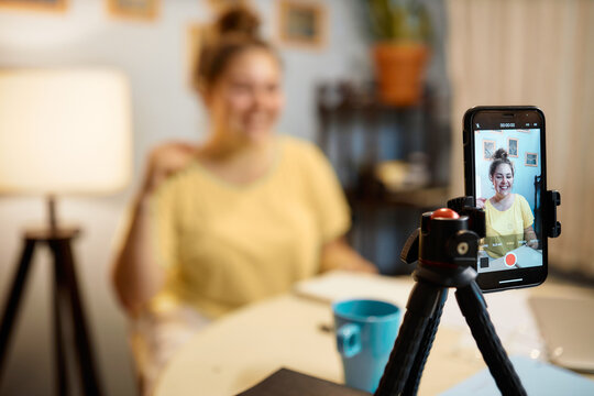 expert in psychology blogger vlogger influencer recording content while - Powered by Adobe