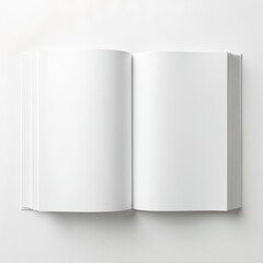 An open book mockup with blank pages lying flat on a white surface ready for content and creative design work