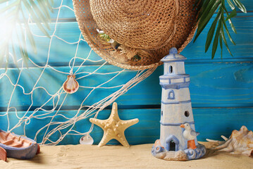 Summer holidays background with with seaside souvenirs on blue boards