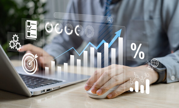 Businessman is analyzing and planning long term cost, product quality, budgeting, financial forecasting, profit and quality management concept and forecasting company income and expenses