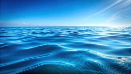 Fototapeta premium Undulating blue water surface with subtle wave ripples and gentle ocean waves