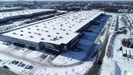 Snow covered warehouse complex - Powered by Adobe