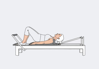 A woman performing a Pilates exercise on a reformer machine, focusing on core strength.