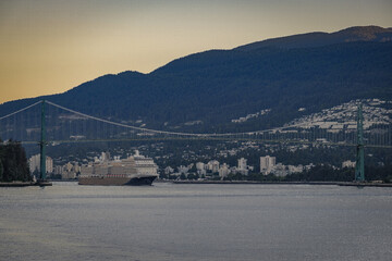Modern luxury cruiseship cruise ship liner Koningsdam, Nieuw Statendam or Rotterdam arrival into Vancouver BC port, Canada from Alaska cruise with breathtaking nature landscape scenery