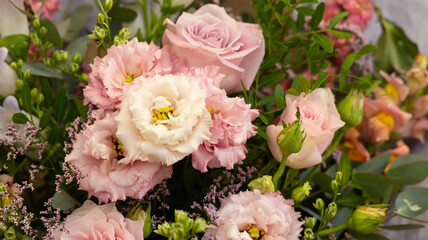 Beautiful bouquet of pink roses and lisianthus, creating a romantic and elegant atmosphere