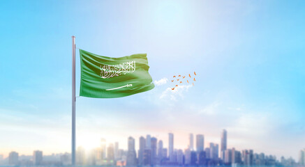 Saudi Arabia national flag waving with skyline and buildings. Saudi Arabian national flag for...