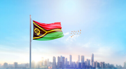 Vanuatu national flag waving with skyline and buildings. Vanuatu national flag for independence day.