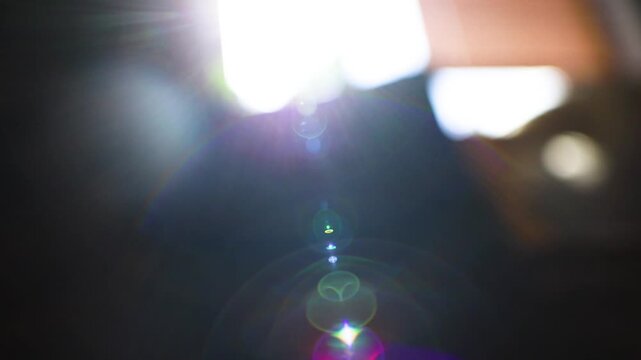 Waking up. Morning sunlight. Interior lens flare. Looking out of bed. Blurry vision. Window