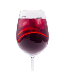 Elegant red wine served in a crystal glass with ice cubes and glowing liquid
