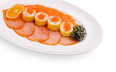 Delicious platter of smoked salmon and sushi rolls garnished with citrus