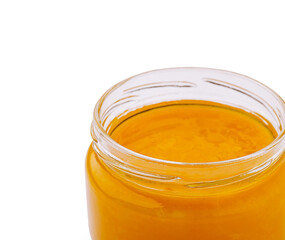 Glass jar with sweet and sour mustard sauce close up on white background