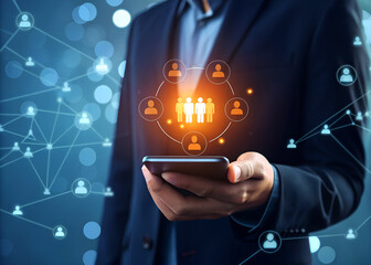 Businessman holding smartphone with glowing network of people connections