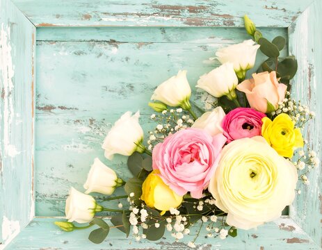 Pastel flowers in antique frame