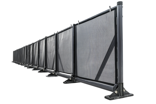 Long industrial safety fence barrier with mesh panels on transparent background