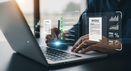 Photo of a professional reviews financial data and invoices on a laptop with a futuristic digital interface