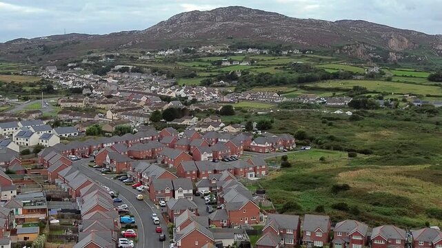 Welsh townhouse modern property aerial view establishing decent over rocky mountain neighbourhood
