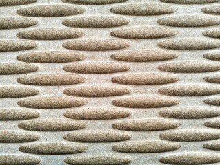 a modern abstract surface pattern with a raised texture. The horizontal ellipses, neatly arranged...