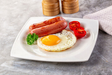 Breakfast with egg and sausages