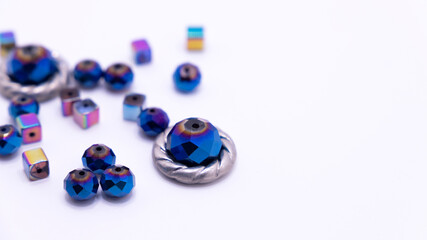 bright blue round and square beads in close-up