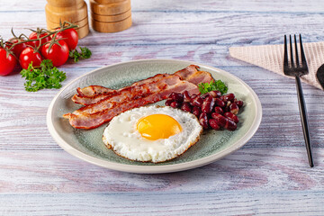 English breakfast with egg, bean and bacon