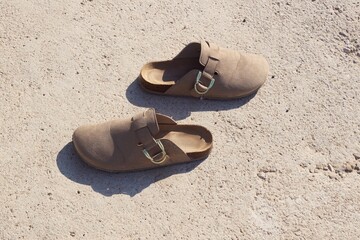flip flops on the sand