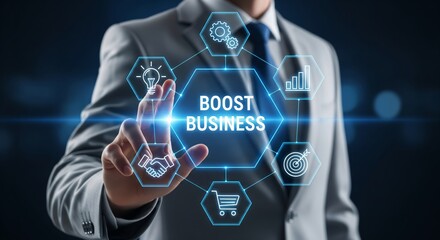 Businessman touching holographic “BOOST BUSINESS” hexagon with business icons — futuristic high-tech interface