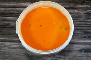 assorted seafood creamy soup of shrimps, squid, crabs, fish fillet, herbs, dill, garlic and onion,...
