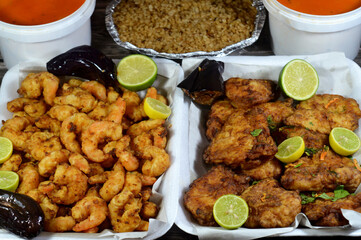 seafood dishes of Fried Epinephelus fish fillet, Fried shrimps, fish rice, and assorted seafood...