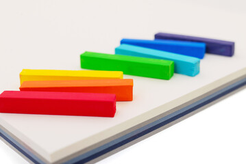 Rainbow pastel sticks isolated on white