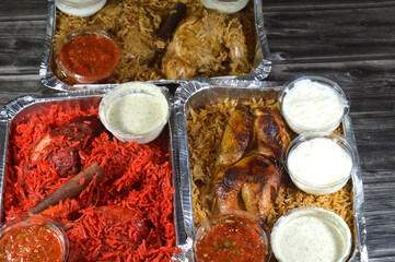 Assorted meals of Tandoori juicy chicken, roasted chicken and original one and colorful Basmati...