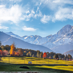 Fabulous autumn view of Haidersee (Lago della Muta) lake with Ortler peak on background.