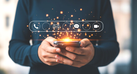 Person holding a smartphone with glowing icons of phone, email, chat, and video call above the screen