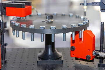 Bolts Rotate at Carousel in Metal Factory Production