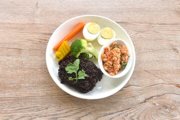 spicy chop chicken chili sauce Thai northern food dipping fresh vegetable topping half cutting boiled egg and rice berry on plate