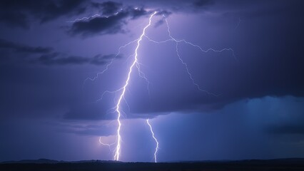 Dramatic lightning strike over a dark stormy landscape with electric blue flashes illuminating clouds.