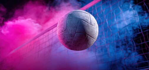 The soccer ball soaring through colorful smoke in a dynamic sports setting.