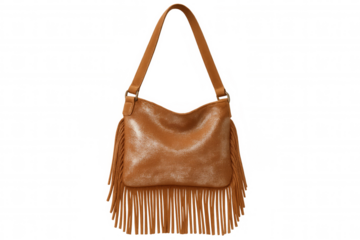 Fashionable brown suede fringe handbag, transparent backdrop highlighting trendy bohemian accessory with textural leather detailing