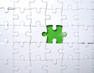 Fototapeta premium A white jigsaw puzzle with one missing piece