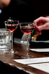 Two Cocktails on a Bar