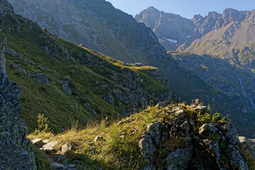 GRENOBLE, FRANCE, August 11, 2025 : Far view of the Refuge Jean Collet, a small hut for hikers, and...