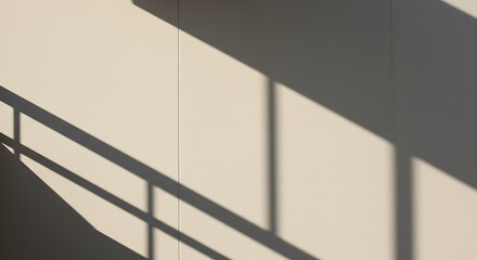 Abstract shadows of a railing on a wall in the sunlight