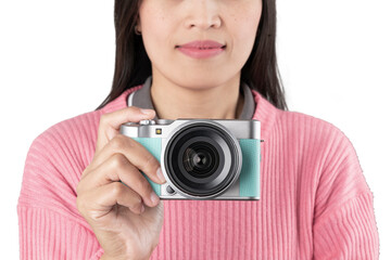 Woman Holding Mint Green Mirrorless Camera (Isolated)