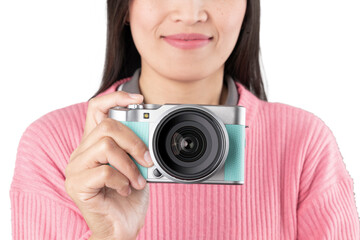 Woman Holding Mint Green Mirrorless Camera (Isolated)