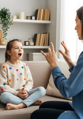 Neurodivergent kid girl in speech therapy practicing articulation with therapist guidance to improve pronunciation communication and autism spectrum inclusion awareness
