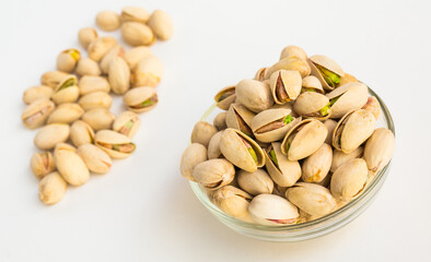 roasted pistachios on white background