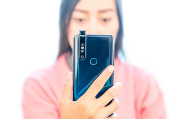 Woman Looking at Blue Smartphone Close Up (Isolated)