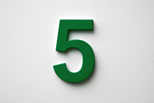 A bold, dark green number 5 on a bright white surface